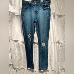 Old navy size 10 rockstar mid rise, skinny, jeans with distressed knees